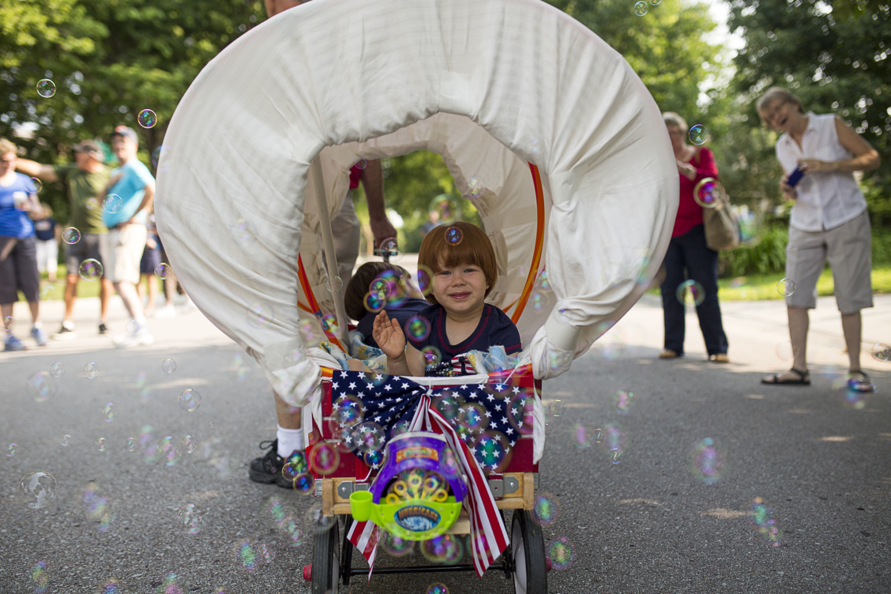 Bubbles and boy at Indian Village parade, 2015